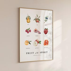 May include: A printable poster with a white background and gold frame. The poster features a watercolour illustration of nine fruits, each representing a fruit of the spirit. The fruits are labelled with their corresponding virtue: love, joy, peace, patience, kindness, goodness, faithfulness, gentleness, and self-control. The poster also includes the text "FRUIT of the SPIRIT" and "Galatians 5:22-23".