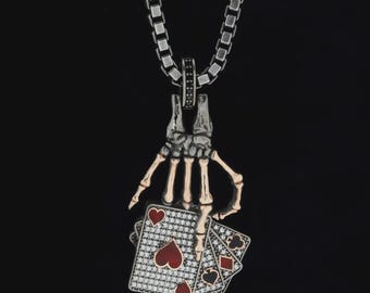 Skeleton Hand Holding Cards Necklace – Gothic Poker Pendant for Men – Gambler Jewelry, Spade Heart Club Diamond Chain