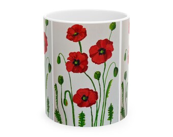 May include: White ceramic mug with a red poppy flower design. The mug features a repeating pattern of red poppies with green stems and leaves on a white background.