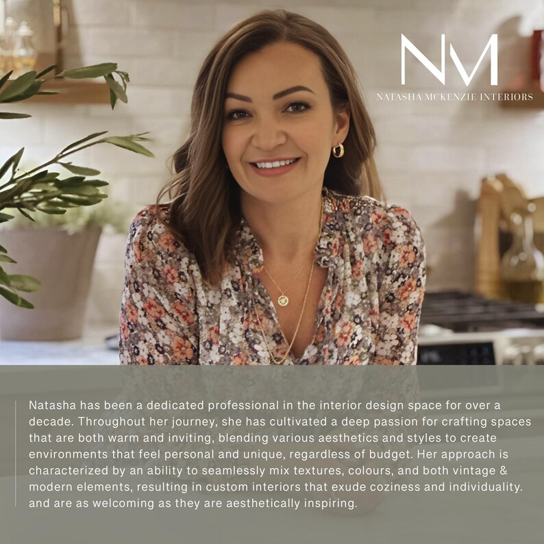 May include: A woman with long brown hair smiles at the camera. She is wearing a floral blouse and a gold necklace. The text "NM NATASHA MCKENZIE INTERIORS" is displayed in the upper right corner of the image.