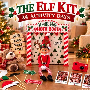 May include: The Elf Kit 24 Activity Days set includes a North Pole Photo Booth structure, a plush teddy bear, a toy elf wearing reindeer antlers, a red toy camera, and various handheld photo props with text like Grab a Prop, Strike a Pose, Nice, and Naughty.
