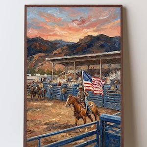 May include: An oil painting depicting a rodeo scene at sunset with a rider on a brown horse carrying an American flag. The foreground features blue metal fencing, while the background shows a covered grandstand, spectators, and dark mountains under a vibrant orange and blue sky.