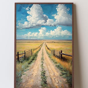May include: A framed landscape painting depicts a dirt road receding into the distance under a bright blue sky filled with fluffy white clouds. The road is flanked by fields of yellow grass and wooden fences.