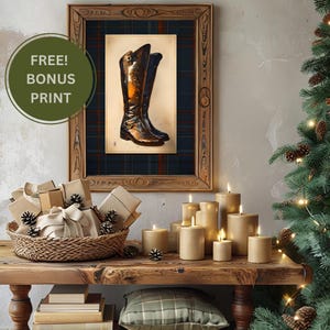 May include: A framed wall art print featuring a pair of brown leather riding boots against a dark blue and red plaid background. The frame is made of wood with a natural grain. A circular green graphic with the text FREE! BONUS PRINT is visible.