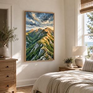 May include: A vertical oil painting in a wooden frame depicting a mountain range with green slopes, rocky peaks, and a dramatic sky filled with swirling blue, white, and golden clouds, displayed on a light-colored wall in a bedroom setting.