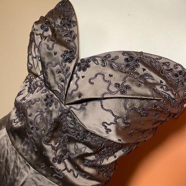 Ornate vintage ball gown with beaded bodice