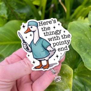 Funny Surgical Tech Badge Reel – Here’s the Thingy with the Pointy End Retractable ID Holder for Nurses, Doctors, Surgeon Appreciation Gift