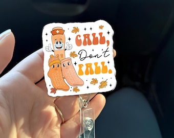 Call Don’t Fall Badge Reel | Funny Fall Autumn Nurse Badge Holder | CNA Medical Staff Safety ID Clip with Bandage and Socks - Nurses Week