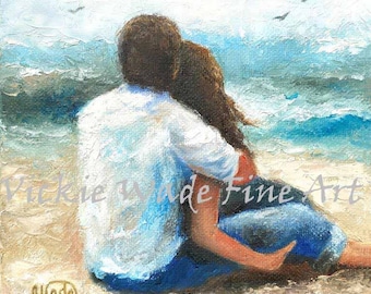 Beach Lovers Art Print loving couple, snuggle, watching waves, ocean, beach, brunette couple, redhead woman lady girl, Vickie Wade Art