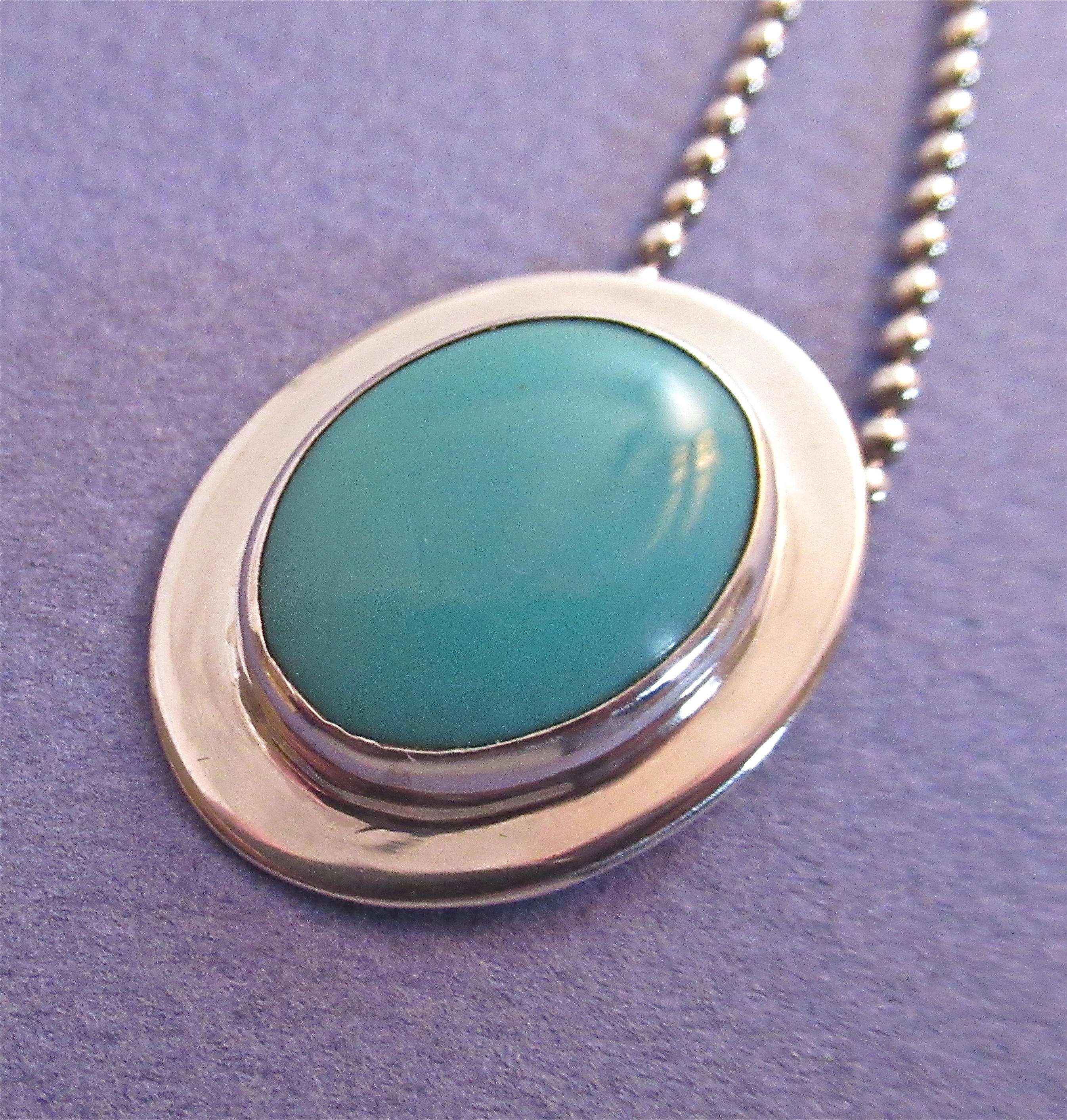 J.Nelson Sterling and Turquoise Oval Pendant