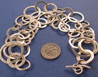 Hammered sterling silver three strand multi-size link chain bracelet
