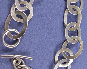 Hammered sterling silver oval/round link bracelet