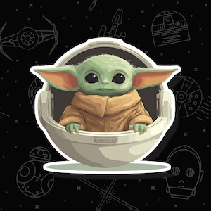 May include: A sticker featuring a cartoon image of Grogu, also known as Baby Yoda, from the Star Wars franchise. The character is depicted in a tan robe, seated in a white pod against a black background with Star Wars themed illustrations.