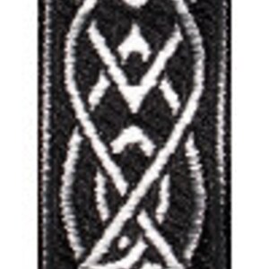 May include: Black and white woven strap with a Celtic knot design.