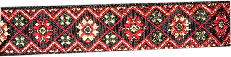 May include: Black ribbon with a repeating pattern of red, gold, and green diamond shapes. The pattern features stylised floral designs.