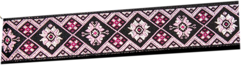 May include: Black ribbon trim with a pink and silver geometric pattern. The pattern features repeating diamond shapes with floral designs.