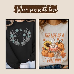 May include: Two sweatshirts are shown. One is black with a snowflake and antler design. The other is light grey with the text "THE LIFE OF A FALL GIRL" and a fall-themed graphic of pumpkins, a sunflower, and a coffee cup.
