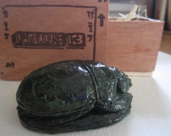 Green Scarab in Wooden Crate