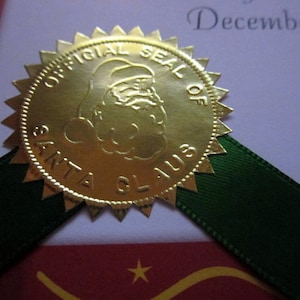 Selos em relevo dourado do Papai Noel (20)