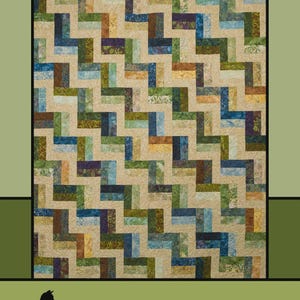 May include: A quilt with a geometric pattern in shades of beige, blue, green, and brown. The quilt features the text "Rail Fence" at the top and "Melissa Milligan for Villa Rosa Designs" at the bottom.