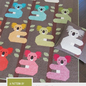 May include: A quilt and pillow pattern featuring colorful koala designs. The quilt showcases koalas in various colors like blue, yellow, and pink, set against a brown background. The text "KOALAS" is displayed at the top.