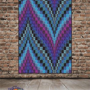 May include: A rectangular quilt titled "Ocean Waves" with dimensions of 48" x 72". The quilt features a geometric pattern in shades of blue, purple, and black. The design resembles waves. The quilt is displayed against a brick wall.