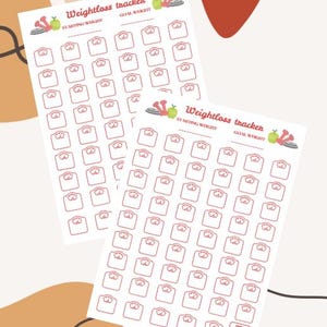 May include: Two white weight loss tracker sheets with red scale illustrations. The sheets have the text "Weightloss tracker" and spaces for "Starting Weight" and "Goal Weight". Decorative elements include apples and weights.