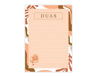 May include: A notepad with the word "DUAS" at the top. The notepad has a peach-colored background with horizontal lines for writing. The border has a white background with abstract shapes in brown, peach, and orange. A graphic of hands holding prayer beads is at the bottom.