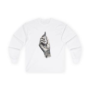 May include: A white long-sleeve t-shirt with a black and white illustration of a hand holding a pair of tweezers.