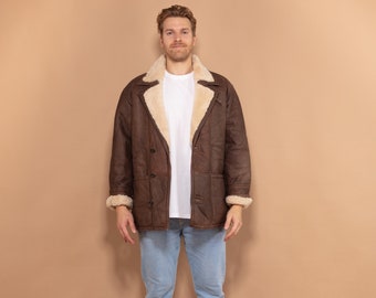 Manteau pour homme en peau de mouton des années 80, grande taille, porté dans un manteau en peau de mouton retourné vintage, manteau épais, pardessus en cuir marron, manteau d'hiver bohème