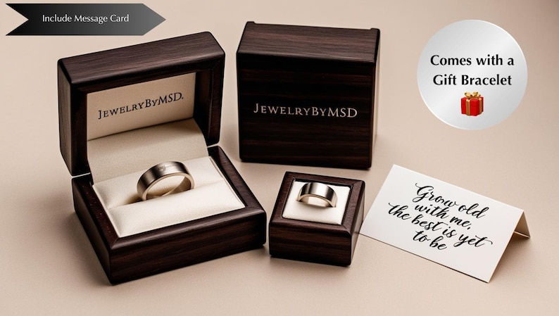 May include: Three dark wooden ring boxes with the JewelryByMSD logo, one open with a silver ring. A gift bracelet is included. A message card reads "Grow old with me, the best is yet to be."
