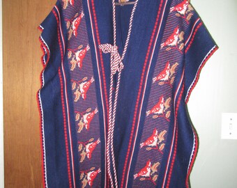 1970's mexican serape FRINGE poncho. red bird novelty knit sweater cape