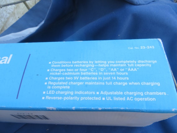 radio shack battery charger plugged in not charging