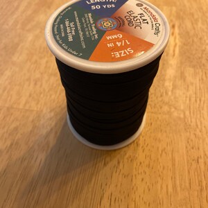 New spool flat .25 1/4 inch elastic black