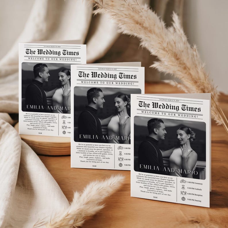 May include: Three white wedding program cards designed like a newspaper titled The Wedding Times. Each card features a black and white photograph of a couple, the names Emilia and Mario, and a schedule of events with icons for the ceremony and reception.