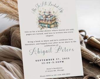 May include: A rectangular bridal shower invitation card featuring a watercolor illustration of stacked books, a teacup, and flowers. The text reads: She Is All Booked Up, Join us for a bridal shower, Abigail Peters, September 27, 2025, 12:00-3:30 PM, Peter's Residence, 17 Green Rd, Chicago, RSVP to Jill +234-909-8812.