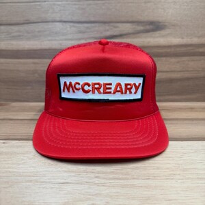 VTG McCreary Tires red trucker mesh baseball snapback hat one size fits all.