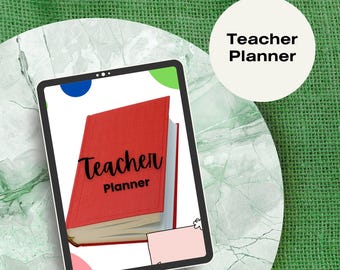 May include: A red digital planner with the text "Teacher Planner" on the cover, displayed on a tablet screen. The tablet is on a marble surface with a green hessian background.