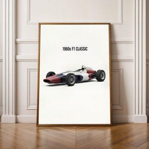 May include: A framed print of a classic Formula 1 car from the 1960s. The car is painted in red, white, and blue. The text "1960s F1 CLASSIC" is above the car. The print is in a wooden frame.