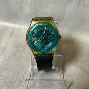 Reloj Swatch clásico para caballero, turquesa, bahía, GK103, años 80, 32 mm, azul raro, batería nueva