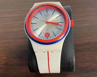 Swatch Sistem51 Arlequin SUTW402 – Swiss Automatic Watch, 42mm, Skeleton Dial, Colorful Design, Unisex, Mechanical Movement