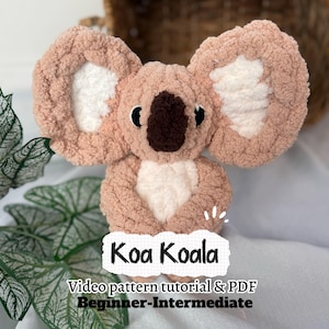May include: A plush koala toy made of light brown and white yarn with large ears, a dark brown nose, and black eyes. A white label with black text reads Koa Koala, Video pattern tutorial & PDF, Beginner-Intermediate, featuring small white marks.