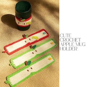 May include: A dark green travel mug with a crocheted apple-themed cozy. Three crocheted apple mug holders in red and green with white centers and button closures are also shown. The text on the right says "CUTE CROCHET APPLE MUG HOLDER."