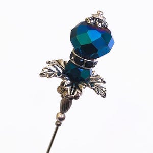 May include: A set of three ceramic mugs with a speckled, matte finish. The mugs are in shades of cream, light gray, and dark gray. Each mug has a simple, minimalist design and a rounded handle. Perfect for coffee or tea.