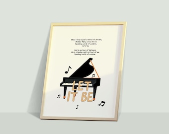 May include: A framed print with a black grand piano illustration and the words "LET IT BE". The design includes musical notes and lyrics, set against a cream background. The frame is a light beige color.