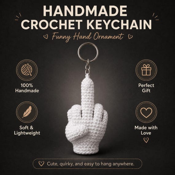 A tiny crochet middle finger — handmade yarn sass you can clip to your bag or keys for a PG-13 statement.