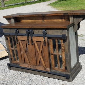 man cave bar with tin / kitchen island bar cabinet w/ sliding barn doors / country furniture / farmhouse furniture / rustic furniture