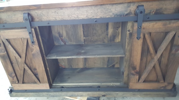 Rustic sliding barn door on sale tv stand