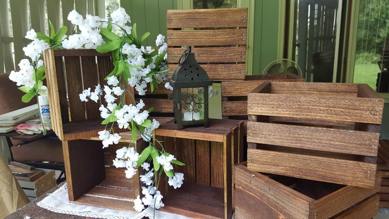 DIY Backyard Wedding Decorations On a Budget wooden crates rustic theam decor for wedding venue entrance, guest table number stand 