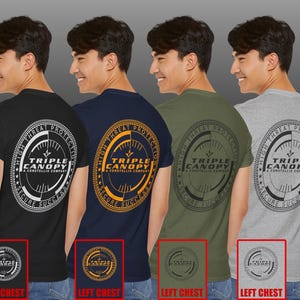 May include: Four men's t-shirts in black, navy blue, olive green, and grey with a circular logo featuring the text "Triple Canopy" and "A Constellis Company". The logo is surrounded by the text "High Threat Protection Secure Success".